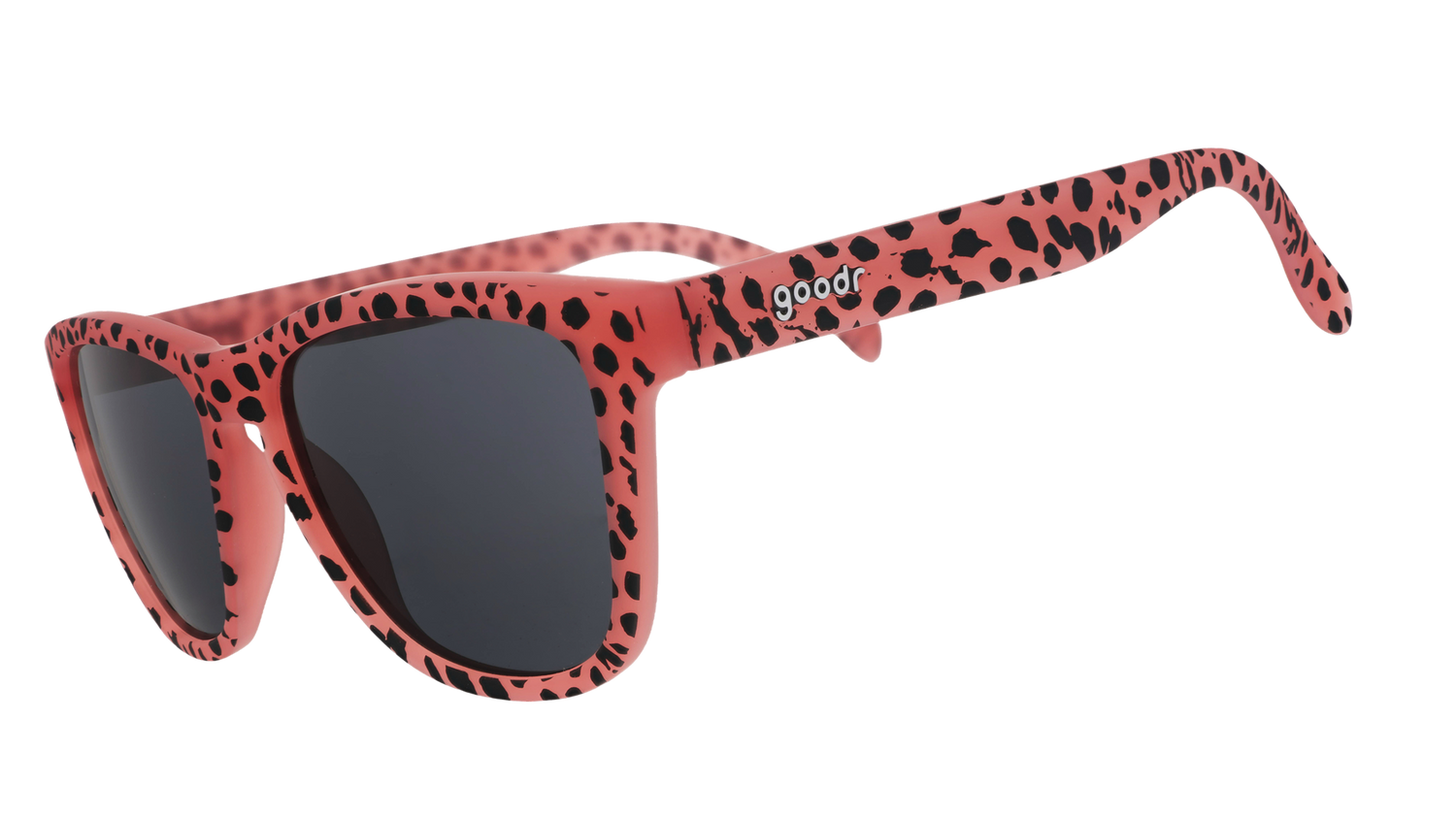 Sunglasses with pink frame and black polka dots on a white background