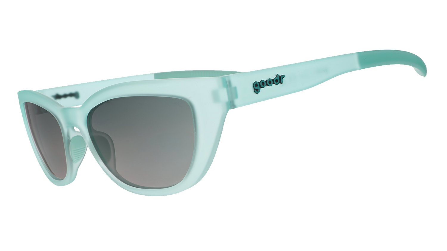 Three-quarter angle view of translucent pale green Cheetah G sunglasses with green gradient lenses.