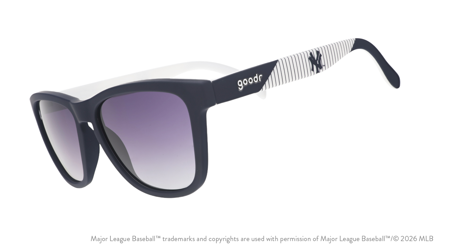 Three-quarter angle view of blue and orange Mets sunglasses featuring the script logo and a New York City skyline on the arm.