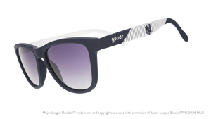 Three-quarter angle view of blue and orange Mets sunglasses featuring the script logo and a New York City skyline on the arm.
