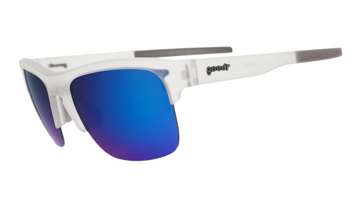 Three-quarter angle view of clear sunnies with half-rim frames+blue reflective lenses tilted down on a white background.