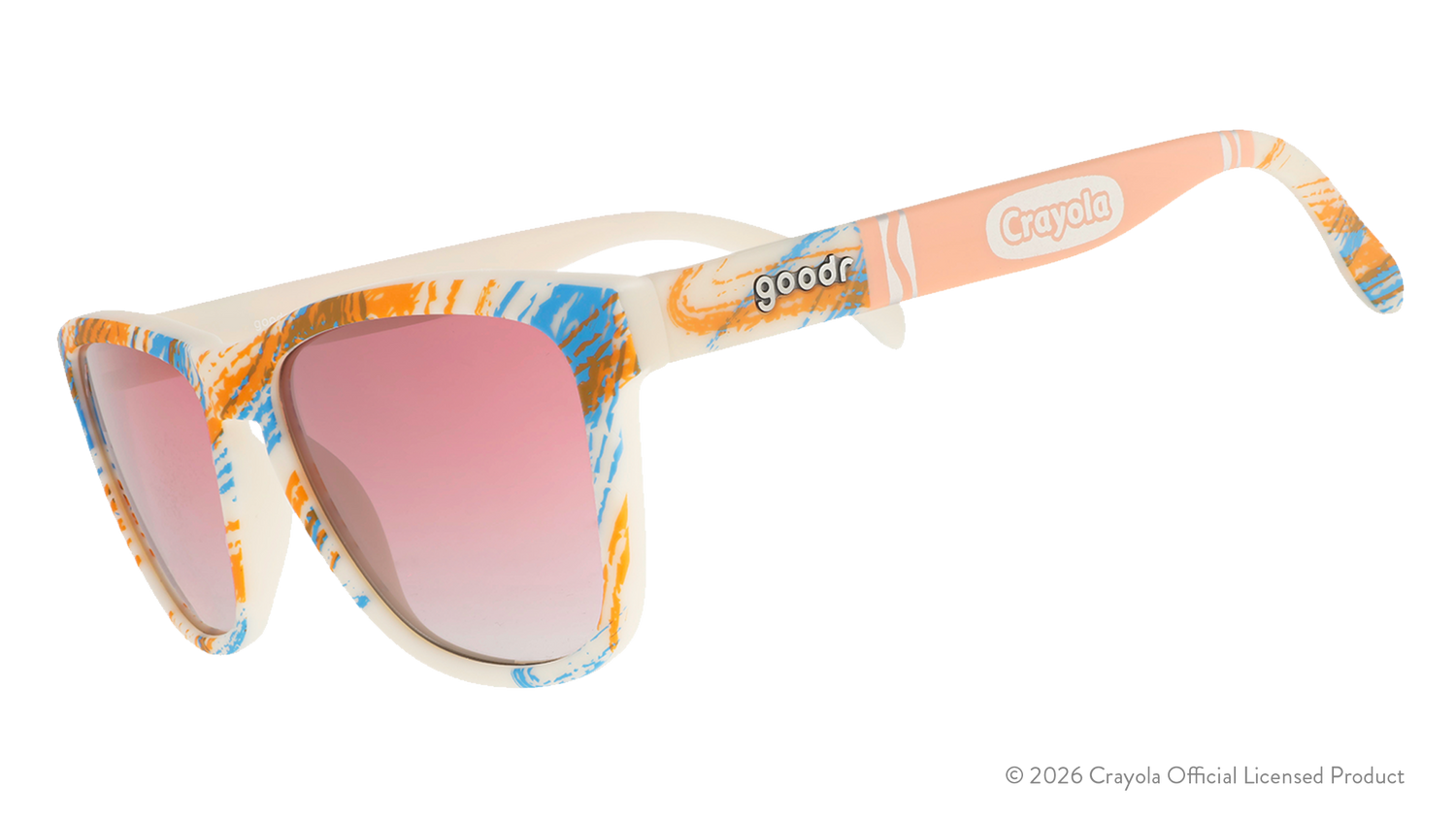 Side view of Crayola goodr UV-activated Summertime shades with tan-to-magenta frames and rose ocean gradient lenses.